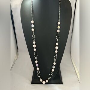 Long silver tone link necklace with pink faux pearls and faceted glass beads